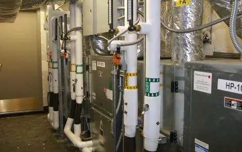 Water-source heat pumps with insulated piping in a mechanical corridor